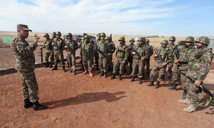 Armenian reservists undergo training at a firing range near Yerevan