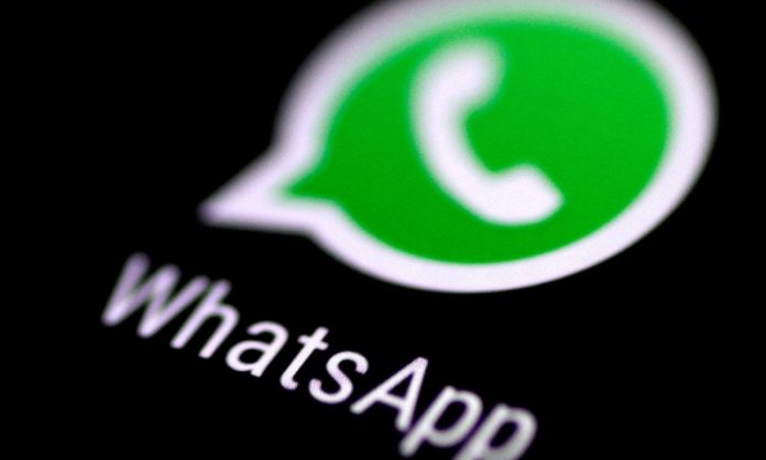 FILE PHOTO: The WhatsApp messaging application is seen on a phone screen