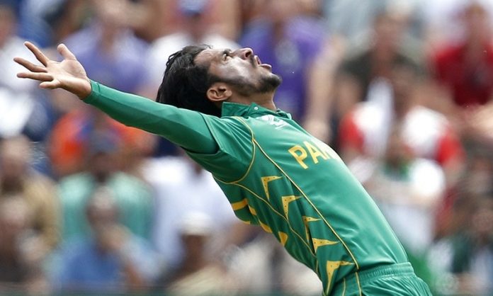 Pakistan's Hasan Ali celebrates after taking the wicket of England's Eoin Morgan (not pictured)